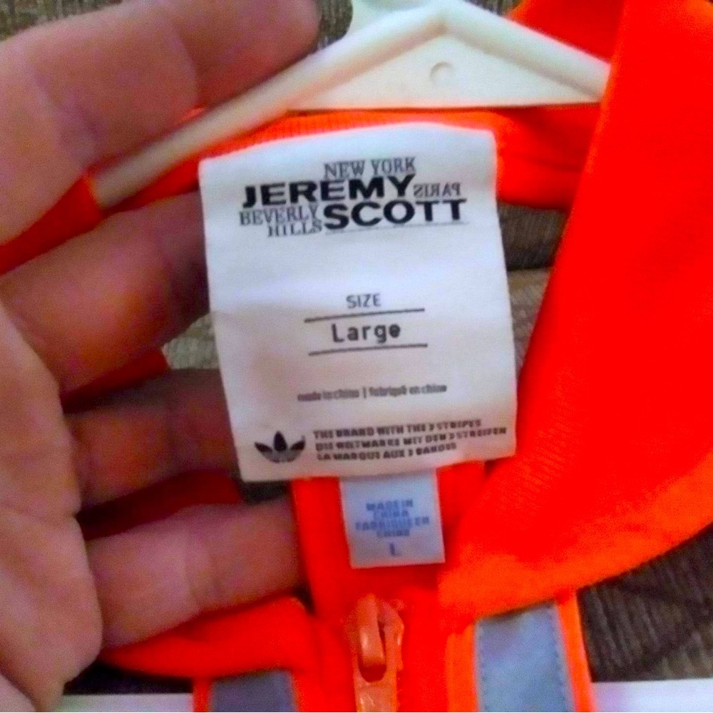 ADIDAS X JEREMY SCOTT Orange deconstructed track jacket.